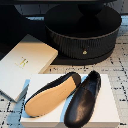 THE ROW 26S LOAFERS IN BLACK CALFSKIN
