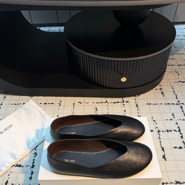 THE ROW 26S CLASSIC BALLET FLATS IN BLACK CALFSKIN