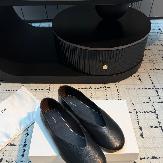 THE ROW 26S CLASSIC BALLET FLATS IN BLACK CALFSKIN