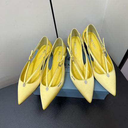 CUT-OUT PUMPS WITH BEAD BUCKLE IN LIGHT YELLOW SATIN