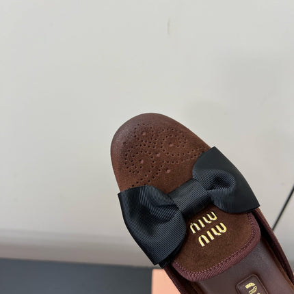 BOW MULES IN CHOCOLATE SUEDE