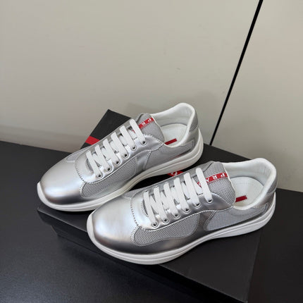 PRADA 26S SNEAKERS IN SILVER CALFSKIN AND WHITE MESH