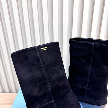 PRADA 25S LOW-CUT BOOTS IN BLACK SUEDE
