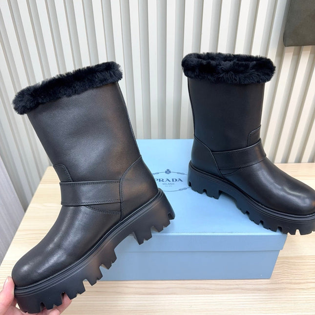PRADA 25S MARTIN BOOTS IN BLACK CALFSKIN FUR-LINED