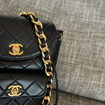 CHANEL 26S BACKPACK WITH FRONT POCKET 21 IN BLACK QUILTED LAMBSKIN GOLD HARDWARE