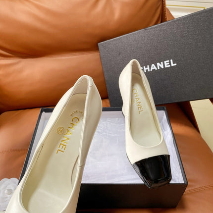 CHANEL 26S HIGH-HEEL 90 MM IN BLACK AND WHITE LAMBSKIN
