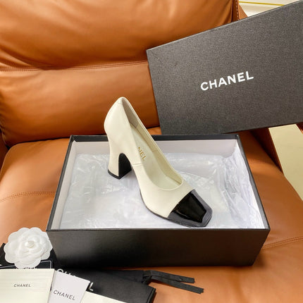 CHANEL 26S HIGH-HEEL 90 MM IN BLACK AND WHITE LAMBSKIN