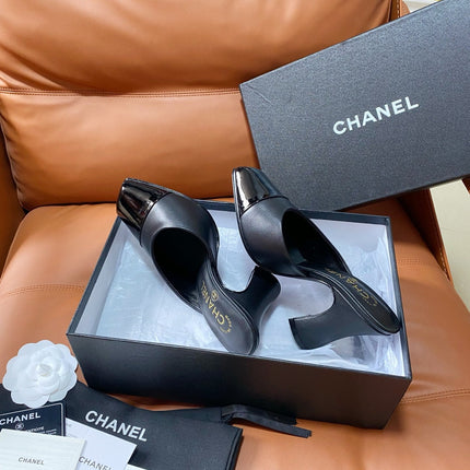 CHANEL 26S HIGH-HEEL MULES 90 MM IN BLACK LAMBSKIN