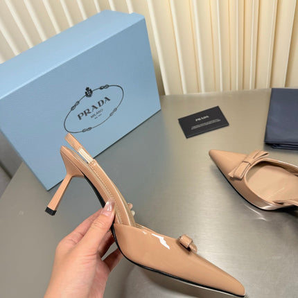 PRADA 26S POINTED-TOE SLINGBACK PUMPS IN BEIGE PATENT CALFSKIN WITH BOW