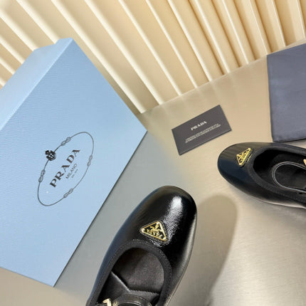 PRADA 26S MARY JANE FLATS IN BLACK SHINY CALFSKIN