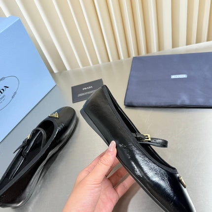 PRADA 26S MARY JANE FLATS IN BLACK SHINY CALFSKIN