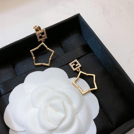 FENDI 26S FF CRYSTAL STAR DROP EARRINGS IN GOLD TONE METAL 622647