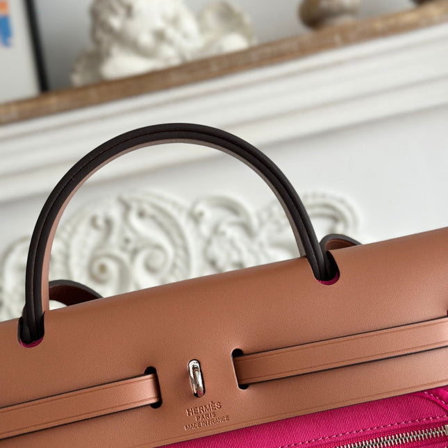 ZIP CABINE 31 BAG IN FUCHSIA PINK CANVAS AND BRONZE BROWN CALFSKIN