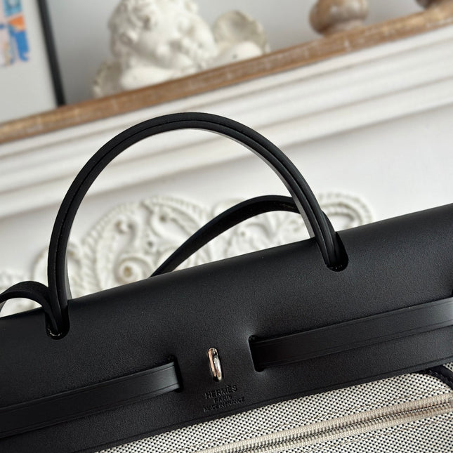 HERBAG ZIP 31 LAQUERED BAG IN OFF-WHITE MIX BLACK H PLUME CANVAS