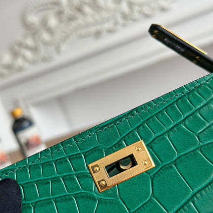 HM 25S KELLY MINI 22 CM IN DARK GREEN LAMBSKIN WITH CROCODILE EMBOSSING AND GOLD HARDWARE