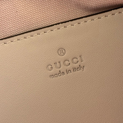 GUCCI 26S GG EMBLEM BUCKET BAG 22 IN LIGHT PINK COATED FABRIC