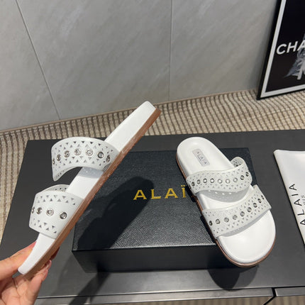 ALAIA DOUBLE-STRAP SANDALS 25S IN WHITE CALFSKIN