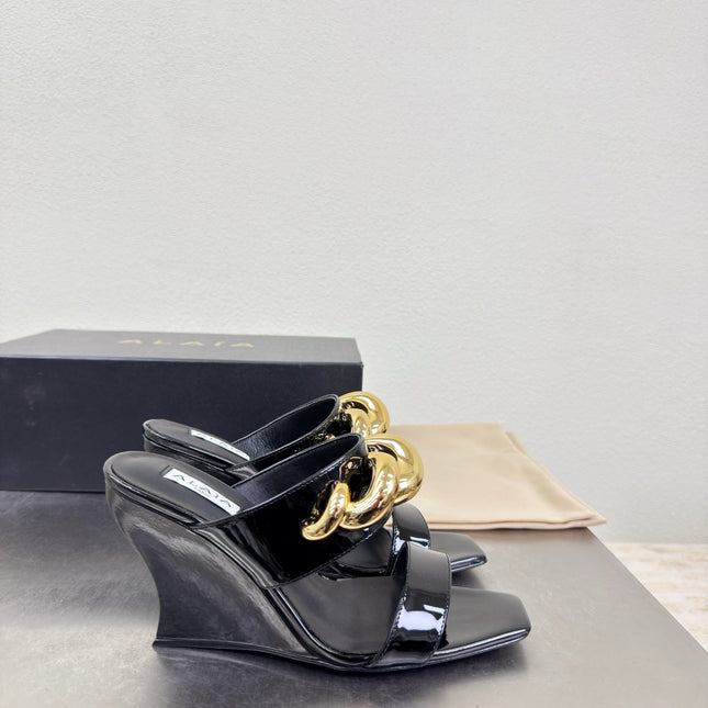 ALAIA 26S DOUBLE STRAP WEDGE SANDALS 110 MM IN BLACK GLOSSY CALFSKIN WITH GOLD HARDWARE