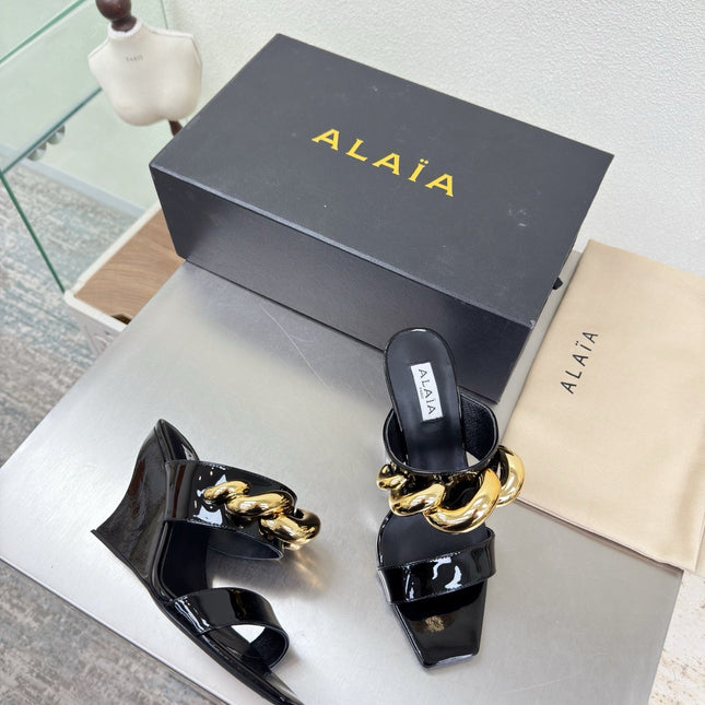 ALAIA 26S DOUBLE STRAP WEDGE SANDALS 110 MM IN BLACK GLOSSY CALFSKIN WITH GOLD HARDWARE
