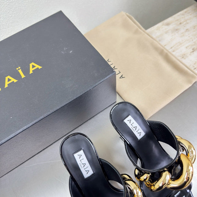 ALAIA 26S DOUBLE STRAP WEDGE SANDALS 110 MM IN BLACK GLOSSY CALFSKIN WITH GOLD HARDWARE