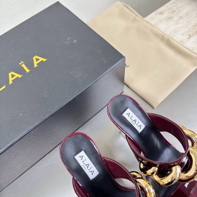 ALAIA 26S DOUBLE STRAP WEDGE SANDALS 110 MM IN DARK RED GLOSSY CALFSKIN WITH GOLD HARDWARE