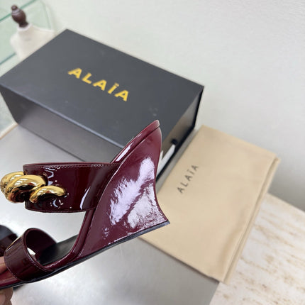 ALAIA 26S DOUBLE STRAP WEDGE SANDALS 110 MM IN DARK RED GLOSSY CALFSKIN WITH GOLD HARDWARE