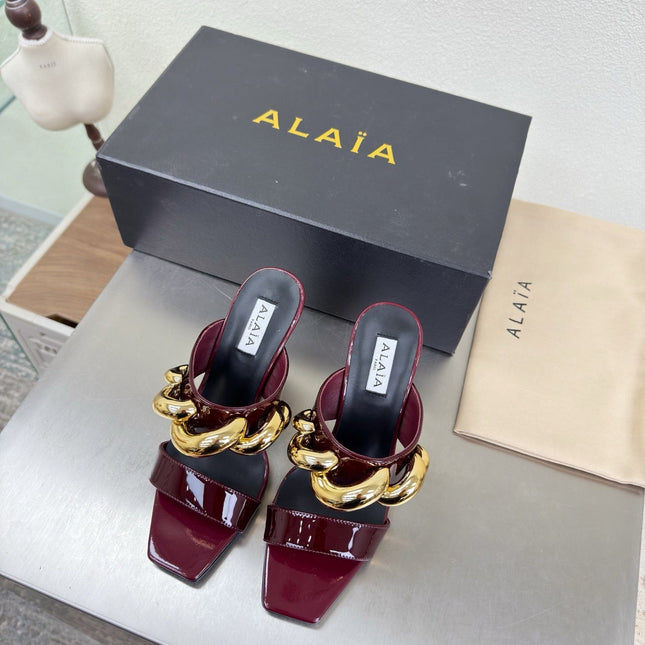 ALAIA 26S DOUBLE STRAP WEDGE SANDALS 110 MM IN DARK RED GLOSSY CALFSKIN WITH GOLD HARDWARE