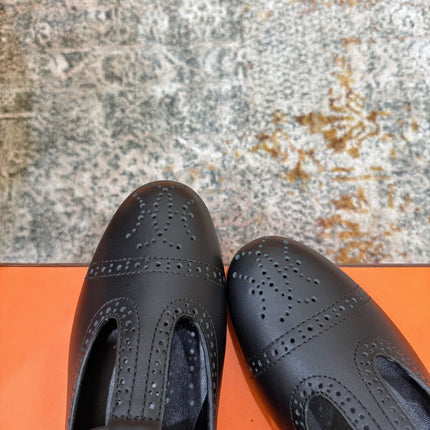 HM 26S PERFORATED BALLET FLATS IN BLACK CALFSKIN