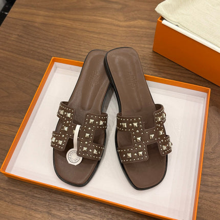 HM 26S ORAN STUDDED SANDALS IN DARK BROWN CALFSKIN