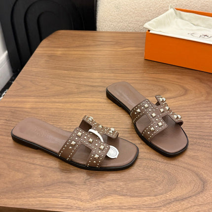 HM 26S ORAN STUDDED SANDALS IN DARK BROWN CALFSKIN