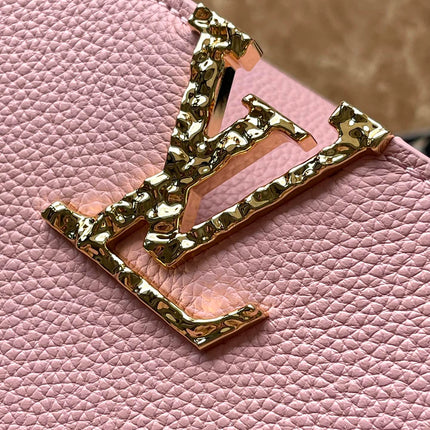 CAPUCINES EAST-WEST 33 IN BLUSH PINK CALFSKIN GOLD HARDWARE