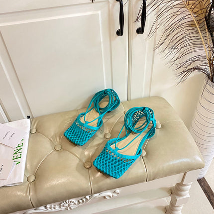 STRETCH LACE-UP FLAT SANDAL IN CERULEAN BLUE METALLIZED MESH AND LEATHER