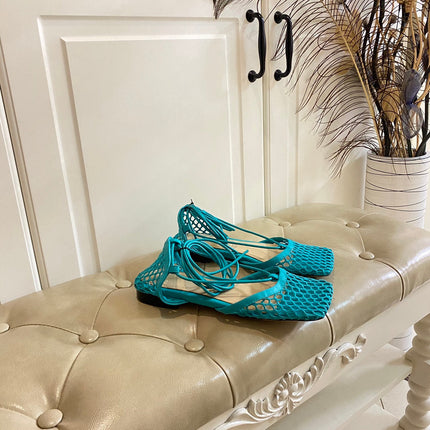 STRETCH LACE-UP FLAT SANDAL IN CERULEAN BLUE METALLIZED MESH AND LEATHER