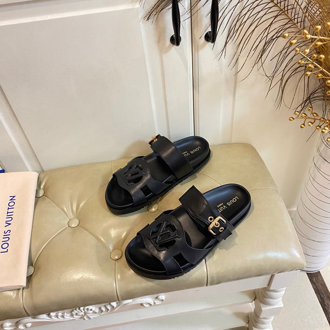 LV 26S ISOLA COMFORT MULES IN BLACK CALFSKIN
