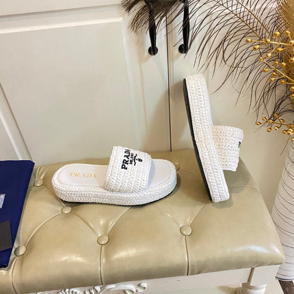 PRADA 26S SLIDE SANDALS IN WHITE LOGO RAFFIA