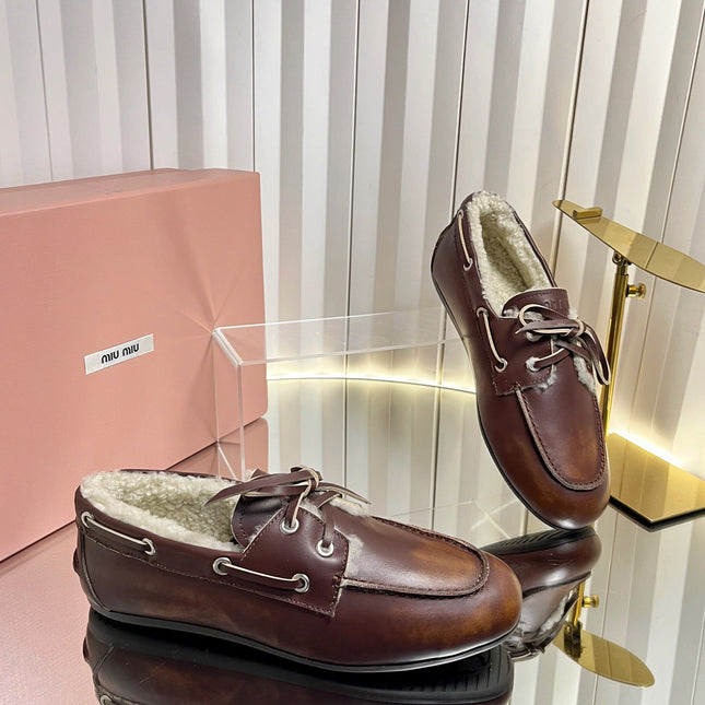 MIUMIU 26S FUR BOAT SHOES IN BROWN CALFSKIN