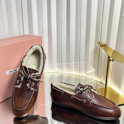 MIUMIU 26S FUR BOAT SHOES IN BROWN CALFSKIN