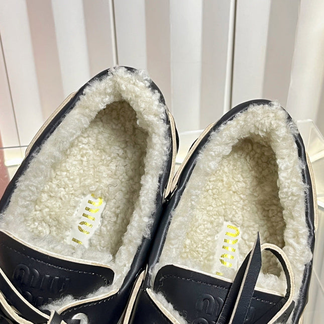 MIUMIU 26S FUR BOAT SHOES IN BLACK CALFSKIN