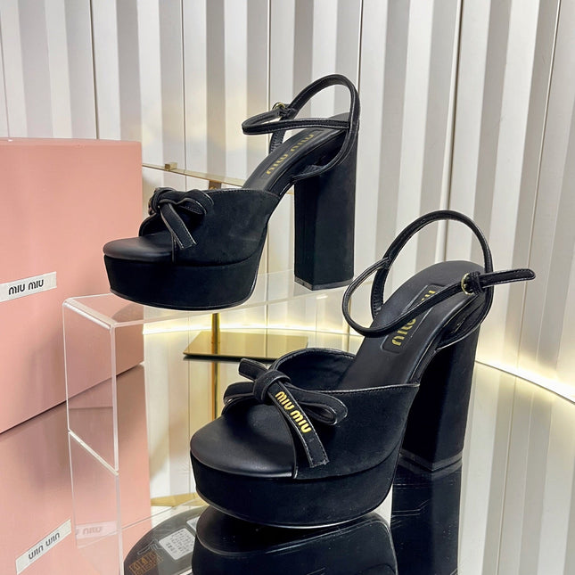 MIUMIU 26S PLATFORM ANKLE STRAP SANDALS 120MM IN BLACK SUEDE WITH BOW