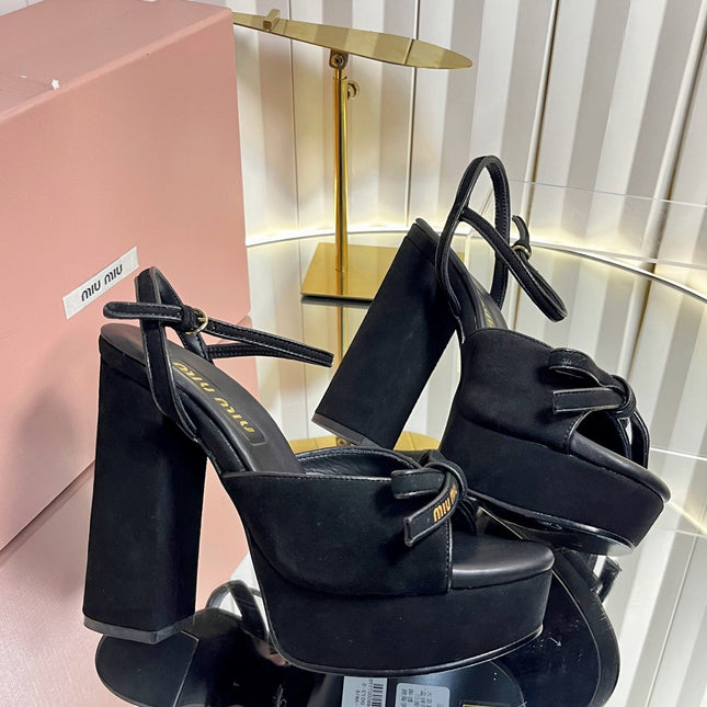 MIUMIU 26S PLATFORM ANKLE STRAP SANDALS 120MM IN BLACK SUEDE WITH BOW