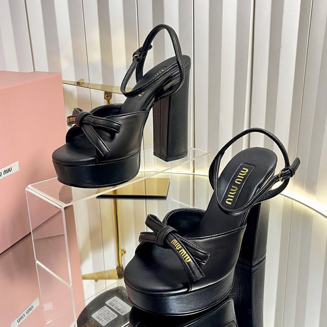 MIUMIU 26S PLATFORM ANKLE STRAP SANDALS 120MM IN BLACK CALFSKIN WITH BOW