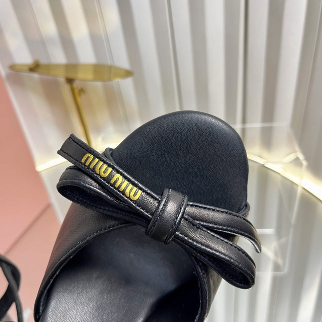 MIUMIU 26S PLATFORM ANKLE STRAP SANDALS 120MM IN BLACK CALFSKIN WITH BOW