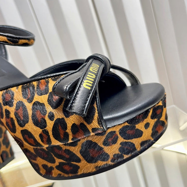 MIUMIU 26S PLATFORM ANKLE STRAP SANDALS 120MM IN LEOPARD PRINT CALF HAIR WITH BOW