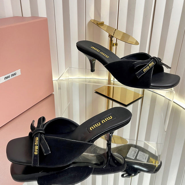 MIUMIU 26S MULE SANDALS 55MM IN BLACK SUEDE WITH BOW