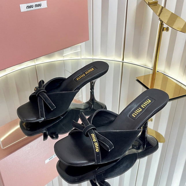 MIUMIU 26S MULE SANDALS 55MM IN BLACK SUEDE WITH BOW