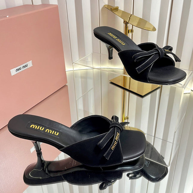 MIUMIU 26S MULE SANDALS 55MM IN BLACK SUEDE WITH BOW