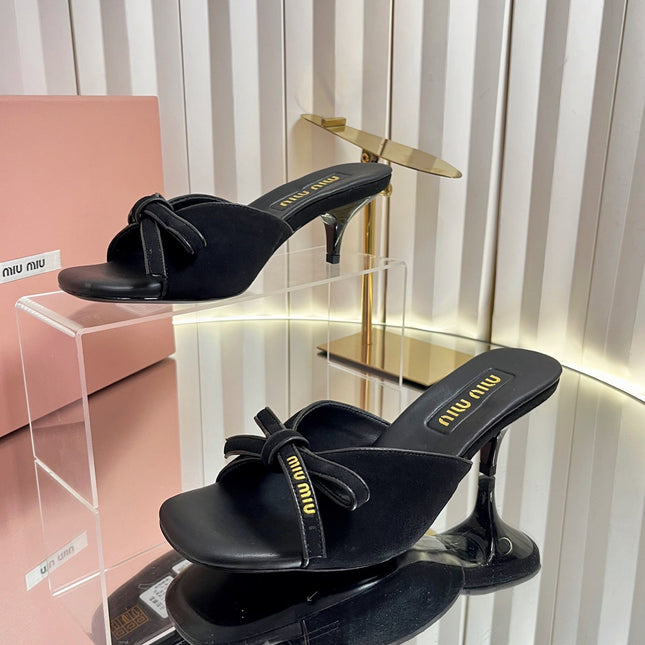 MIUMIU 26S MULE SANDALS 55MM IN BLACK SUEDE WITH BOW
