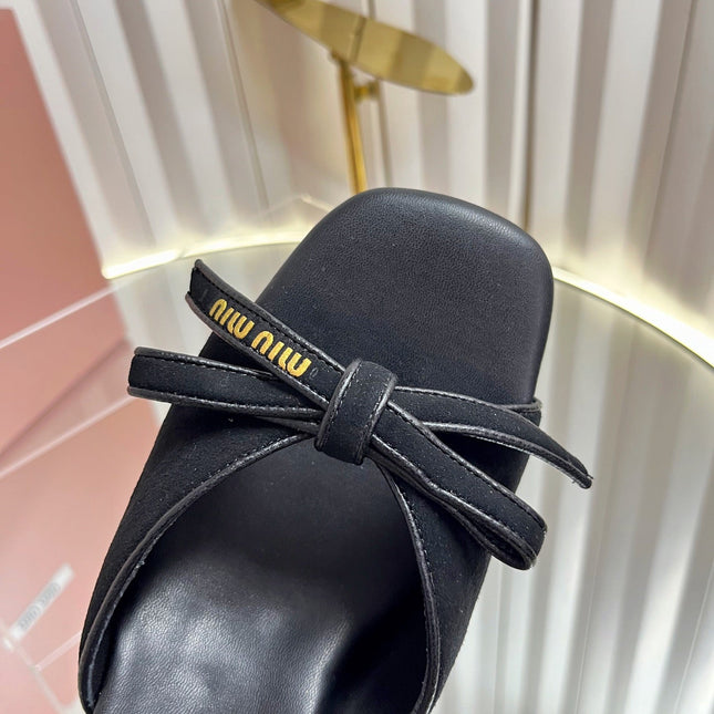 MIUMIU 26S MULE SANDALS 55MM IN BLACK SUEDE WITH BOW