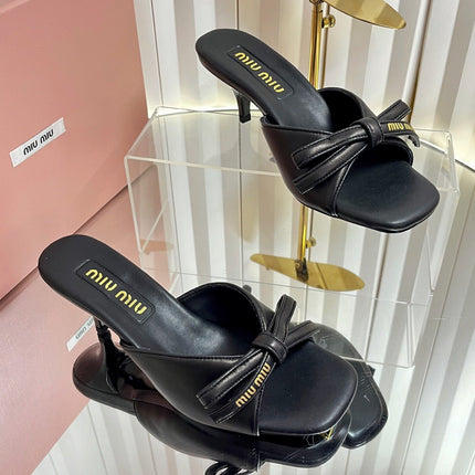 MIUMIU 26S MULE SANDALS 55MM IN BLACK CALFSKIN WITH BOW