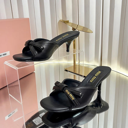 MIUMIU 26S MULE SANDALS 55MM IN BLACK CALFSKIN WITH BOW